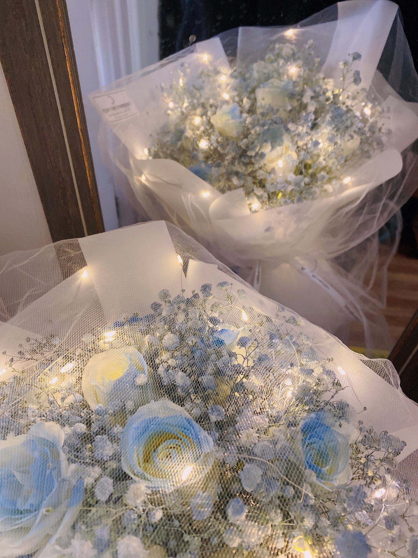 Ice blue rose with blue baby’s breath