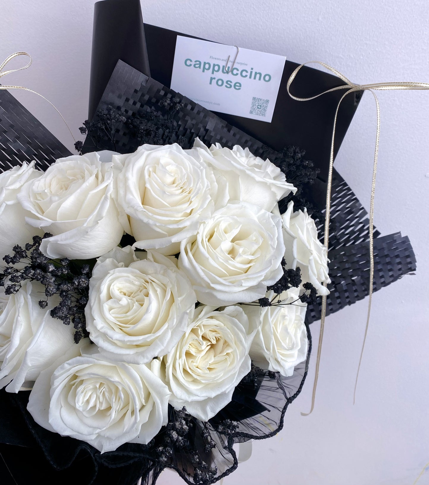 White rose with black baby's breath