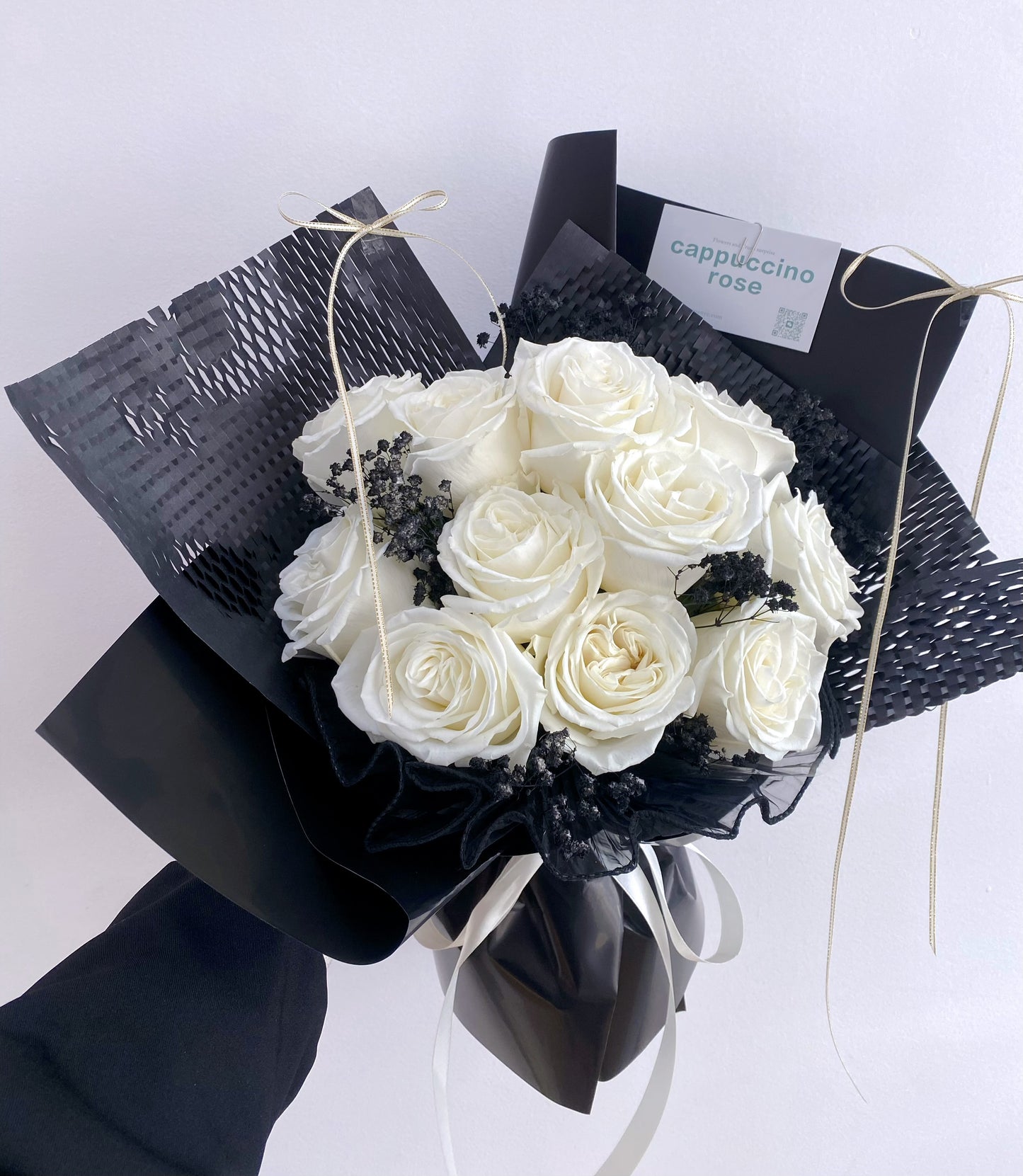 White rose with black baby's breath